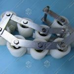 Прижимная роликовая цепь поручня эскалатора, 9 роликов, 70x60 мм, шаг - 83 мм